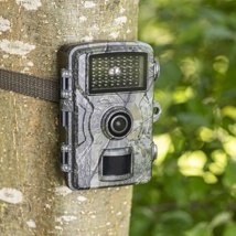 Hunting trail camera with motion and heat sensor