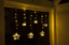 LED star curtain light with 63 warm white LED