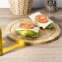 Bamboo chopping board with juice rim dimensions (øcH): 25×1,2 cm